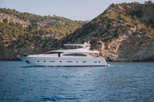 Astondoa 82 GLX Luxury Astondoa 82 GLX yacht cruising near rocky coastline, 2000 model.