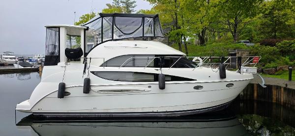 Meridian 368 Motoryacht 2005 Meridian 368 Motor Yacht docked in a serene marina setting.
