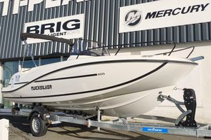 Quicksilver Activ 605 Open 2025 Quicksilver Activ 605 Open boat on trailer outside dealership.