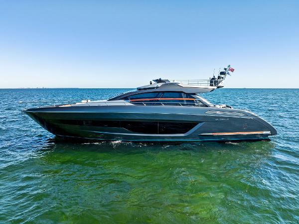 Riva 66' Ribelle Luxurious 2020 Riva 66' Ribelle yacht cruising on open sea.
