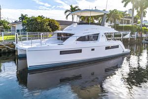 Leopard 43 Powercat 2017 Leopard 43 Powercat yacht docked in a serene waterfront setting.