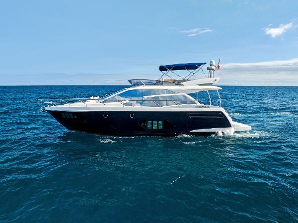 Absolute 55 FLY Luxury Absolute 55 FLY yacht cruising on open sea, 2013 model.