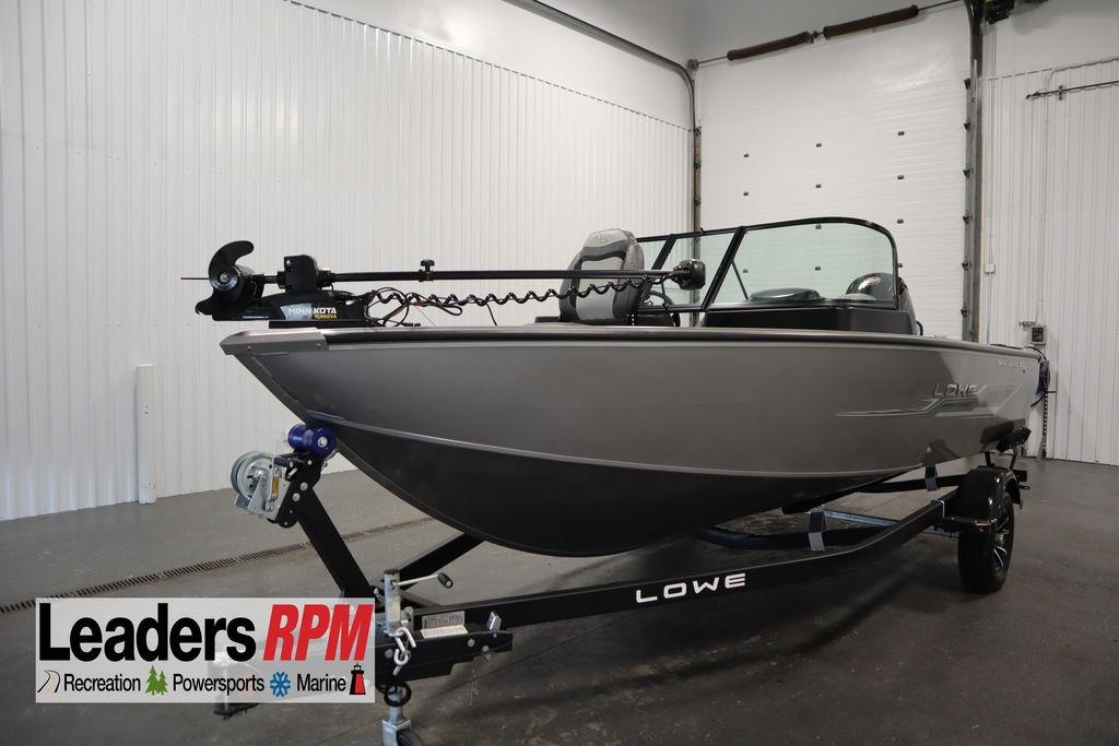 Lowe Fishing Machine 1800 WT 2024 Lowe Fishing Machine 1800 WT boat on trailer in indoor showroom.