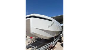 De Antonio Yachts e23 open 2025 De Antonio Yachts e23 Open, 100% electric boat on trailer, side view.