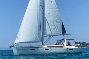 Beneteau Oceanis 45 2014 Beneteau Oceanis 45 sailing on clear blue waters under a sunny sky.