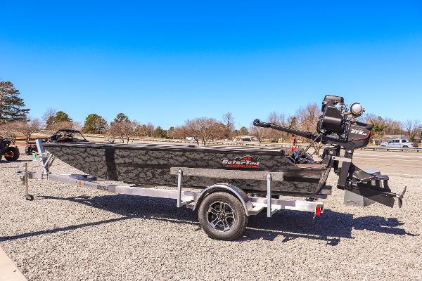Gator-tail 1854 Extreme 2025 Gator Tail 1854 Extreme boat on trailer, parked outdoors under clear blue sky.