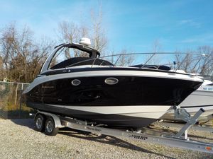 Crownline 264 CR 2019 Crownline 264 CR boat on trailer, side view.