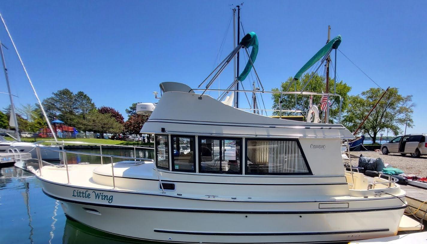 Camano Troll 2005 Camano Troll boat named "Little Wing" docked in a marina.