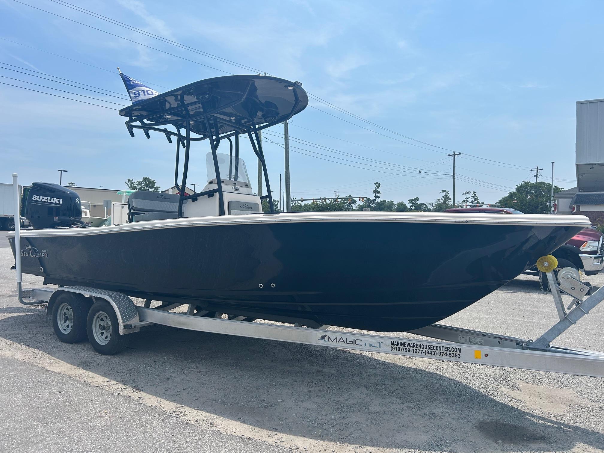 Sea Chaser 26 LX 2025 Sea Chaser 26 LX boat on trailer, side view, outdoors.