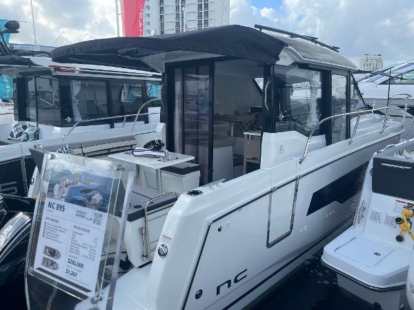 Jeanneau NC 895 Series 2 2025 Jeanneau NC 895 Series 2 boat at marina, showcasing sleek design and modern features.