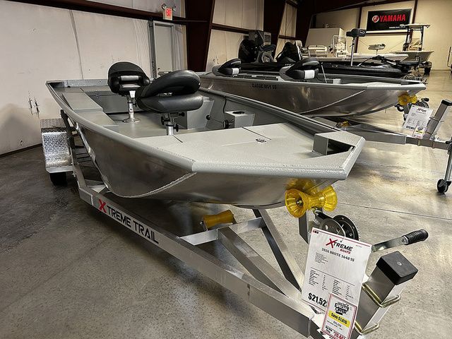 XTREME BOATS Brute 1648Ss 2026 XTREME BOATS Brute 1648Ss on trailer in showroom, featuring sleek design and modern features.
