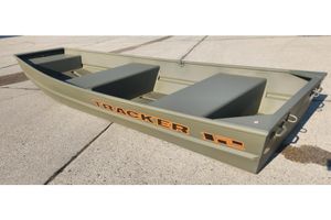 Tracker Grizzly 12 Jon 2026 Tracker Grizzly 12 Jon boat on concrete surface, showcasing durable design.