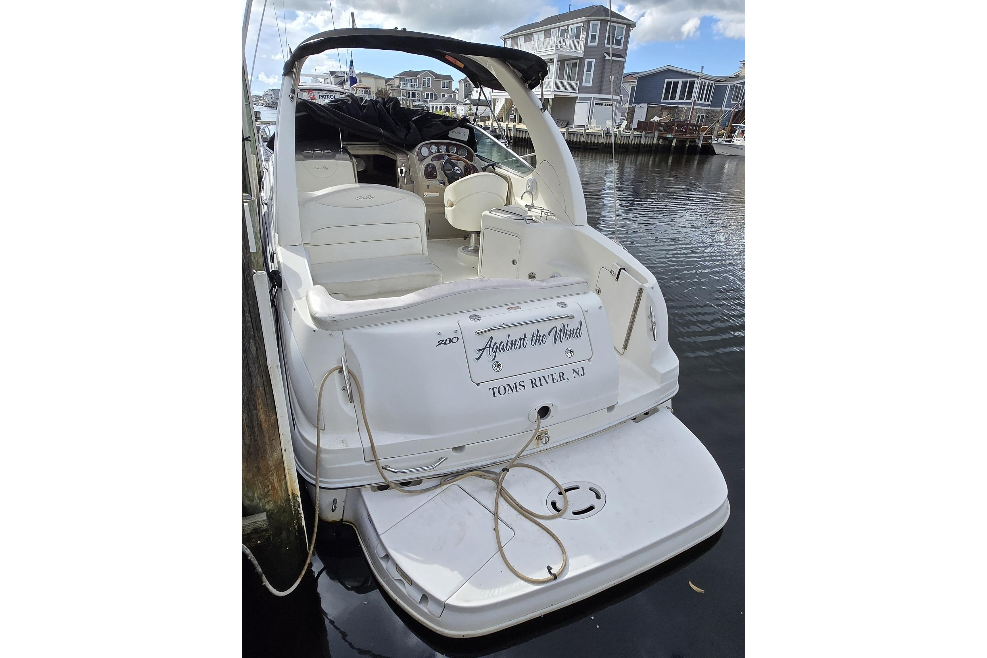 Sea Ray 280 Sundancer 2006 Sea Ray 280 Sundancer docked in Toms River, NJ, rear view.