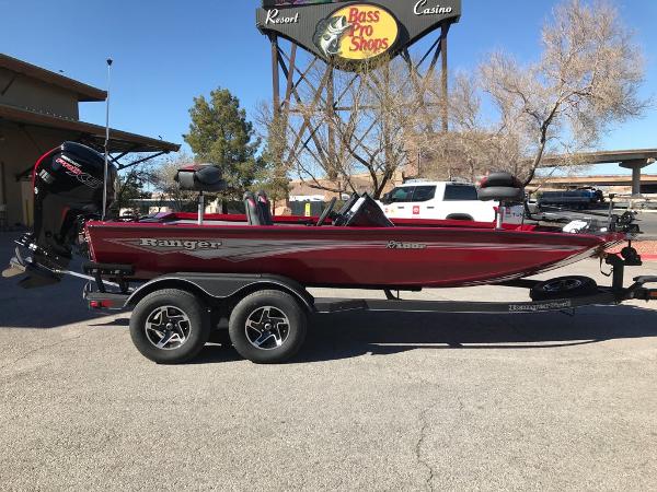 Ranger RT188P 2025 Ranger RT188P boat in red, parked near Bass Pro Shops.