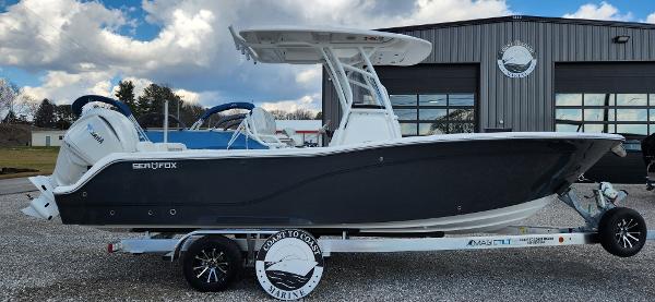 Sea Fox 248 Commander 2024 Sea Fox 248 Commander boat on trailer, parked outside a marine facility.