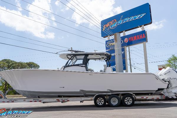 Front Runner 39 Center Console 2023 Front Runner 39 Center Console boat on trailer at dealership.