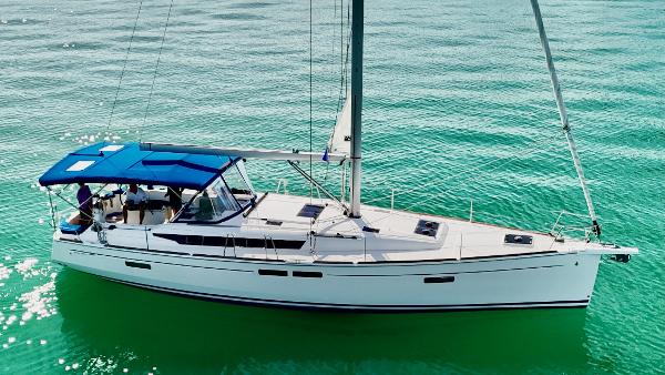 Jeanneau Sun Odyssey 479 2019 Jeanneau Sun Odyssey 479 sailing on clear turquoise water.