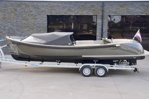 Pieterman 860 Pieterman 860 boat on trailer, 2021 model, sleek design, parked outdoors.
