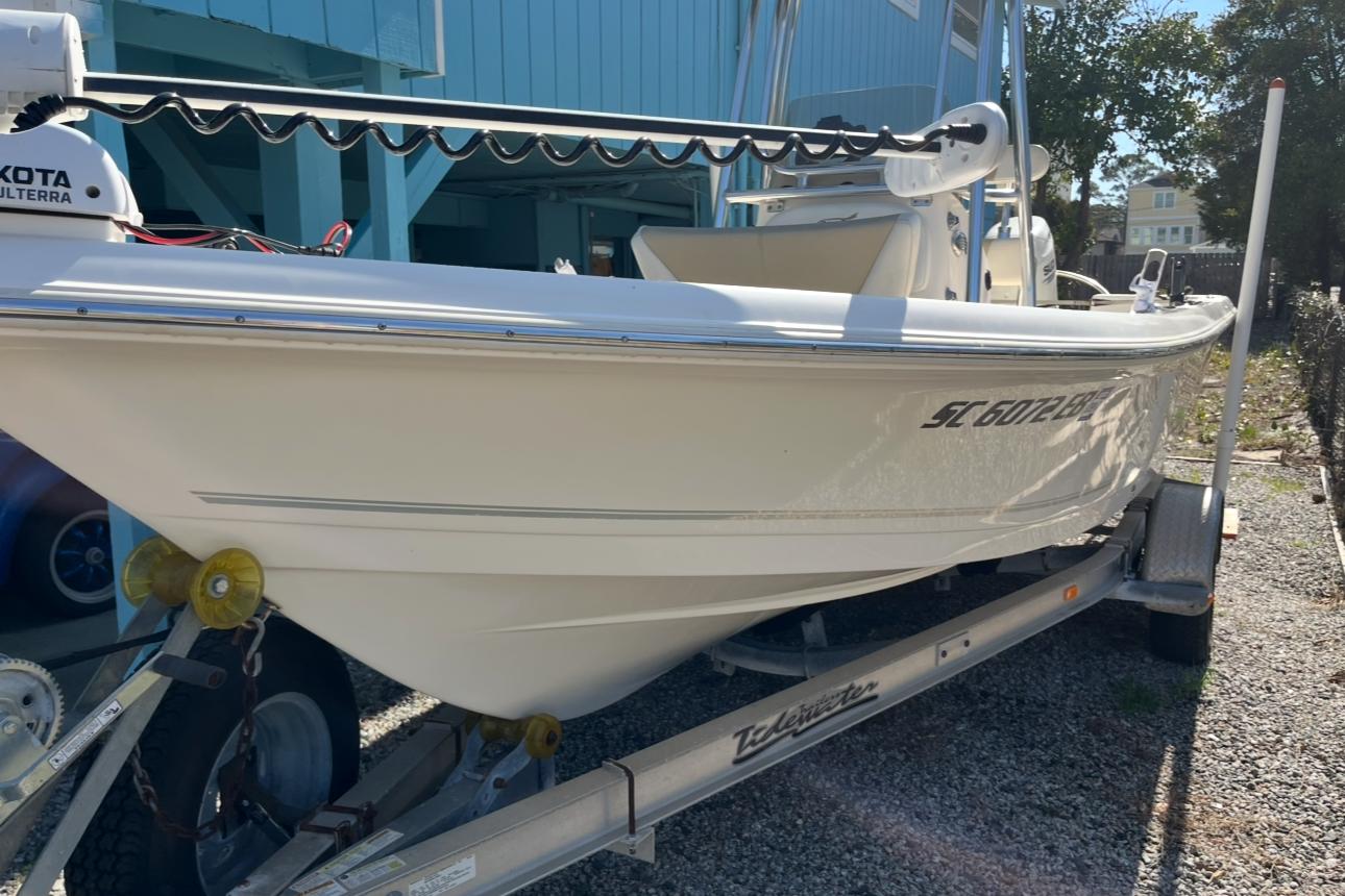 Bulls Bay 2000 2020 Bulls Bay 2000 boat on trailer, parked outdoors, featuring Minn Kota Ulterra motor.