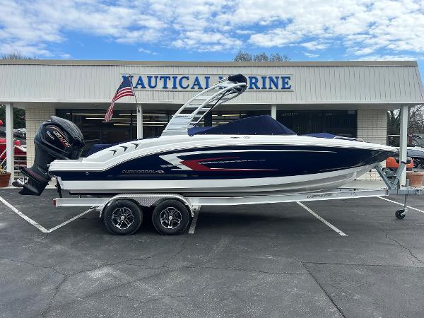Chaparral 23 SSi OB 250HP VMAX 2025 Chaparral 23 SSi OB boat on trailer at Nautical Marine dealership.