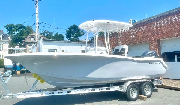 Tidewater 220LXF 2025 Tidewater 220LXF boat on trailer, parked outdoors.