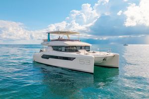 Leopard 53 Powercat 2022 Leopard 53 Powercat yacht on calm ocean waters under a partly cloudy sky.