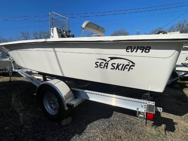 Carolina Skiff EV 198 2024 Carolina Skiff EV 198 Sea Skiff on trailer, side view.