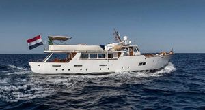 Feadship Classic Canoe Stern 1963 Feadship Classic Canoe Stern yacht cruising on open sea.