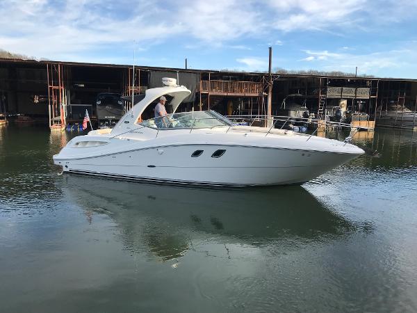 Sea Ray 330 Sundancer 2008 Sea Ray 330 Sundancer yacht docked in marina, calm water, clear sky.