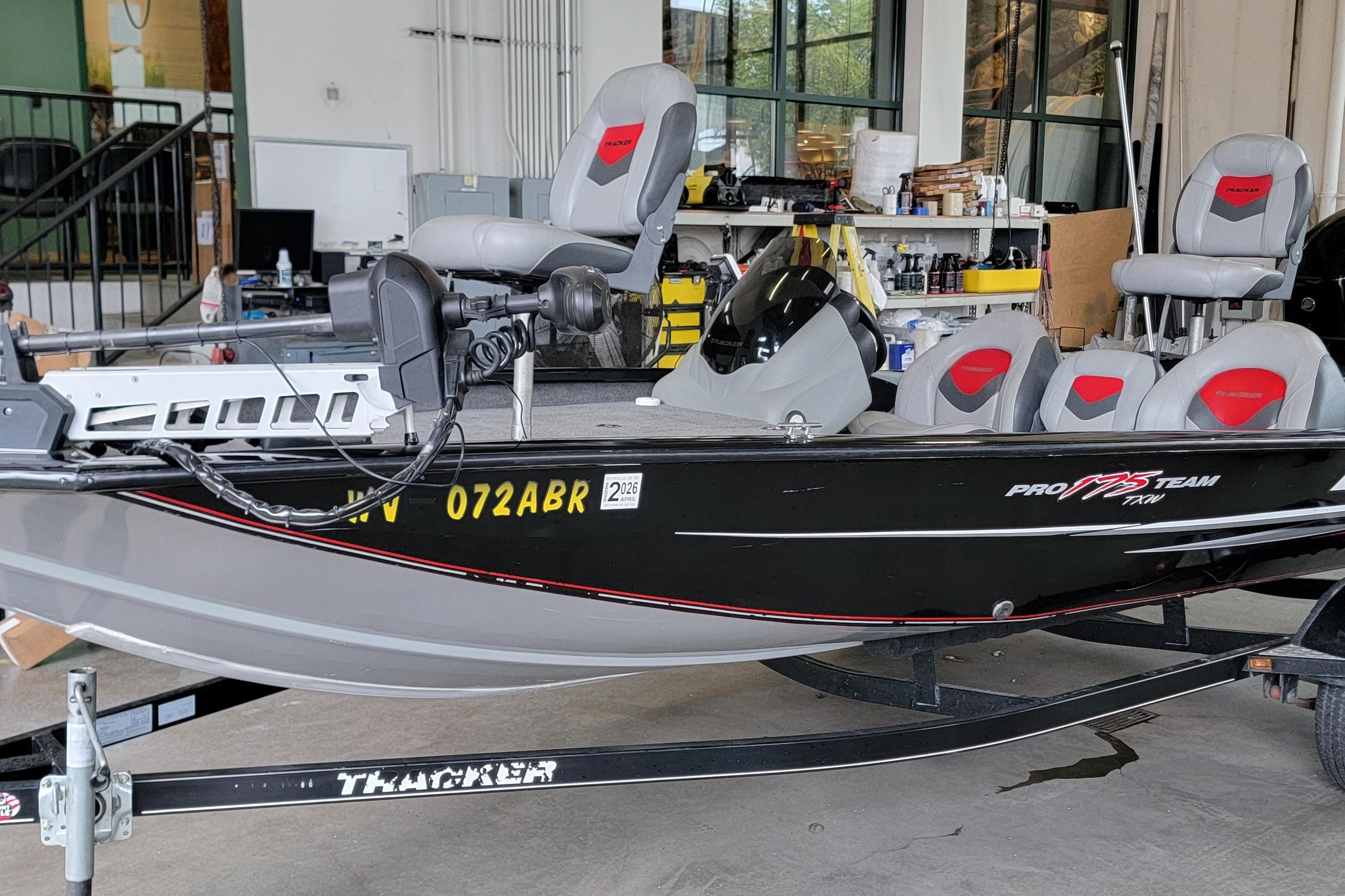 Tracker Pro Team 175 TXW 2015 Tracker Pro Team 175 TXW fishing boat in a garage setting.