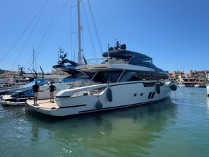 Sanlorenzo SX88 Luxury 2018 Sanlorenzo SX88 yacht docked in a marina under clear blue skies.