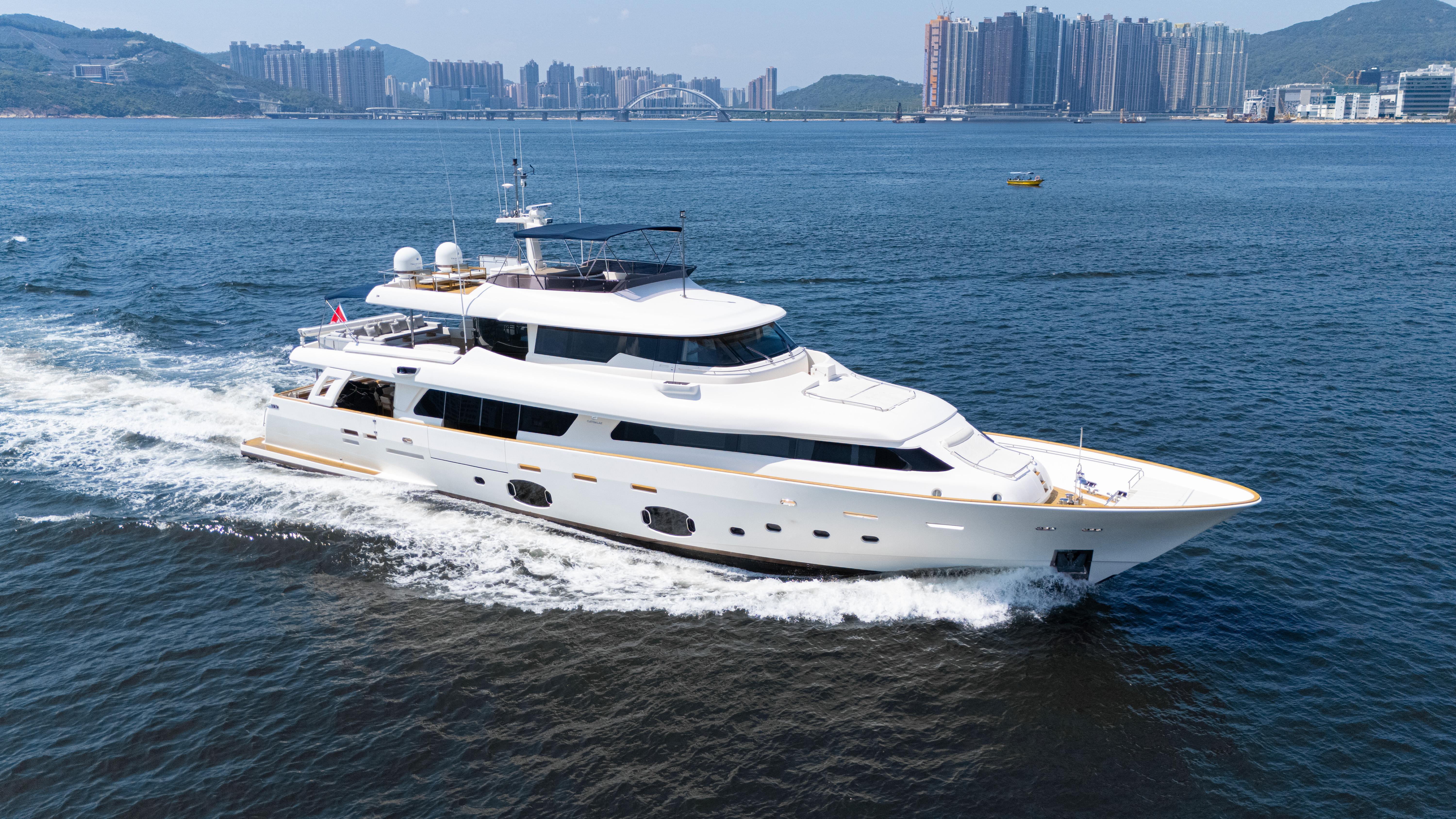 Custom Line Navetta 33 Crescendo Luxurious 2014 Custom Line Navetta 33 Crescendo yacht cruising on open water.