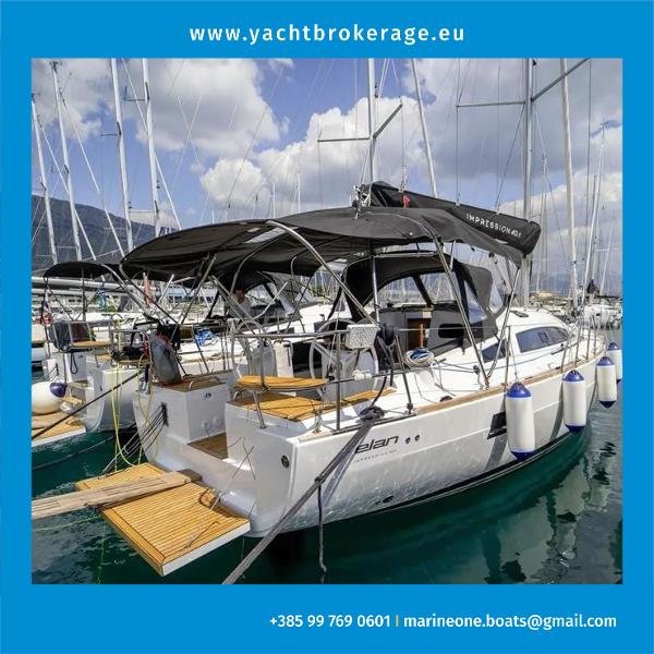 Elan IMPRESSION 40.1 2022 Elan IMPRESSION 40.1 yacht docked at marina, featuring sleek design and modern amenities.