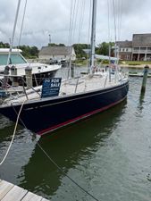 Nautor Swan 44 1973 Nautor Swan 44 sailboat docked, for sale sign visible.