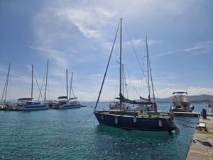 Dufour 2800 CS Sailboats docked at a marina, featuring a 1980 Dufour 2800 CS under a clear sky.