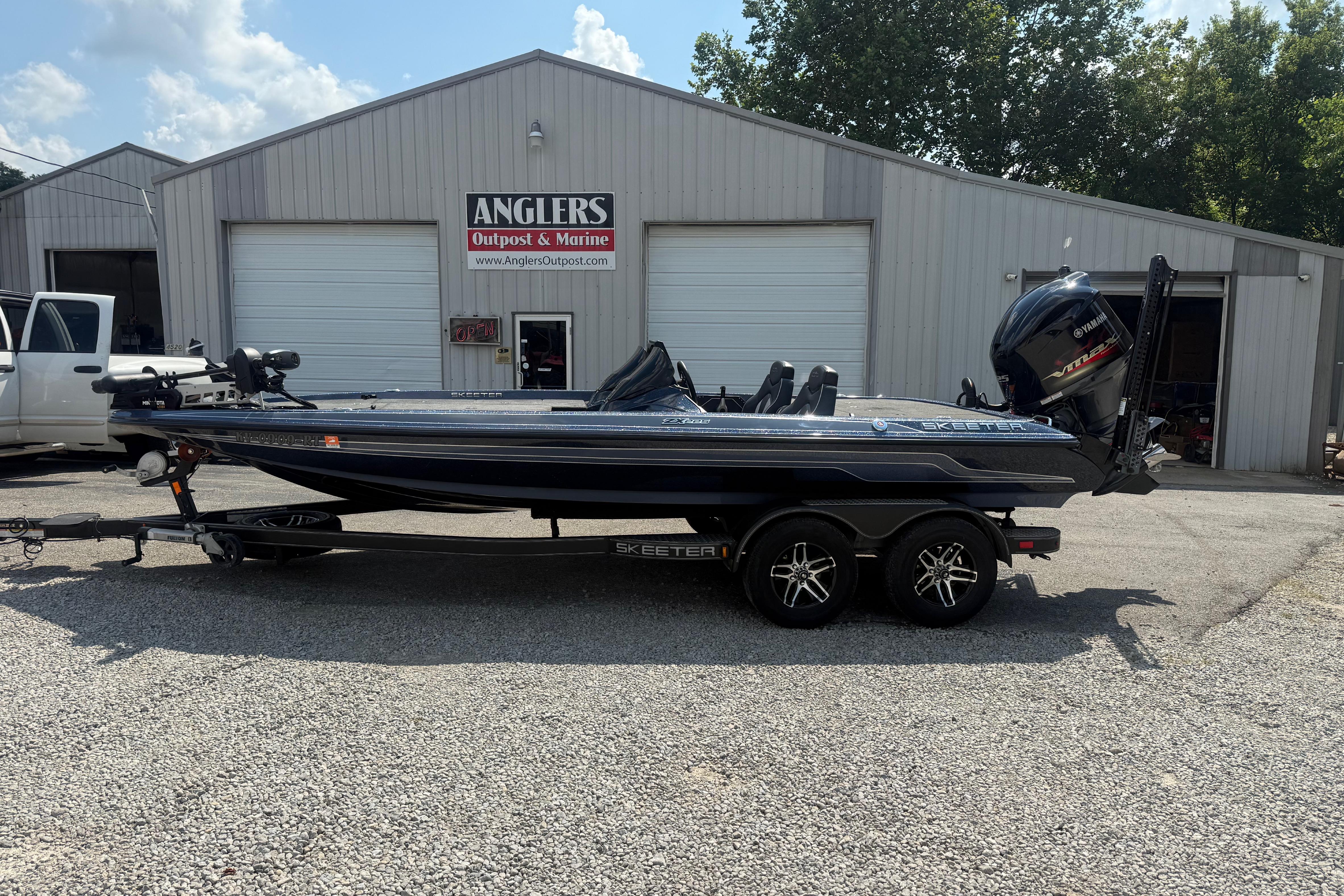 Skeeter ZX225 2020 Skeeter ZX225 boat on trailer outside Anglers Outpost & Marine shop.