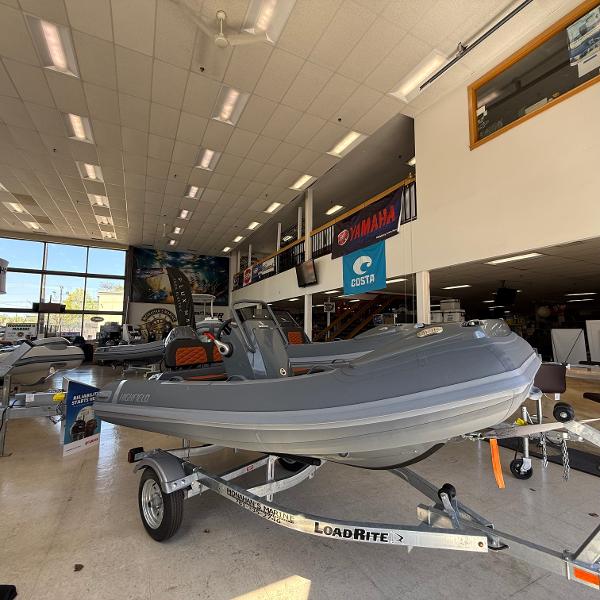 Highfield Sport 360 2025 Highfield Sport 360 boat displayed indoors on a trailer.