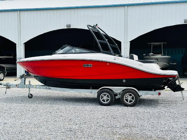 Sea Ray SPX 210 2025 Sea Ray SPX 210 boat on a trailer, red and black hull.