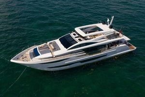 Pearl 95 Luxurious 2020 Pearl 95 yacht cruising on clear blue waters.