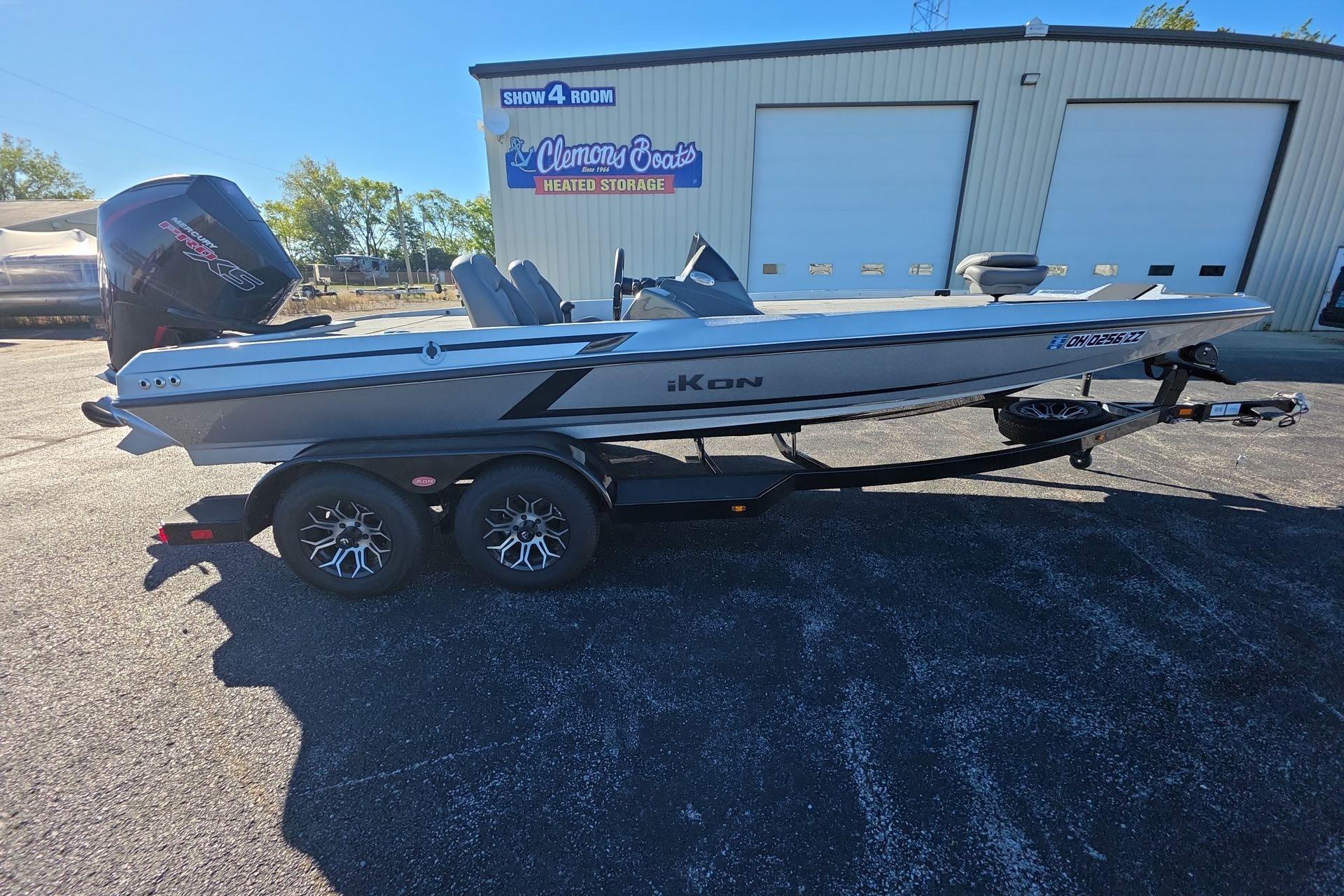 iKon VLX 21 2025 iKon VLX 21 boat on trailer outside Clemons Boats storage facility.