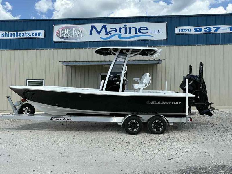 Blazer 2440 2026 Blazer 2440 boat on trailer outside L&M Marine LLC building.