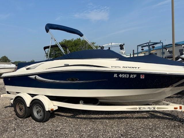 Sea Ray 195 Sport 2008 Sea Ray 195 Sport boat on trailer, blue and white design, parked outdoors.