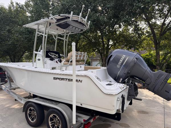 Sportsman Open 212 Center Console 2016 Sportsman Open 212 Center Console boat on trailer with Yamaha outboard motor.