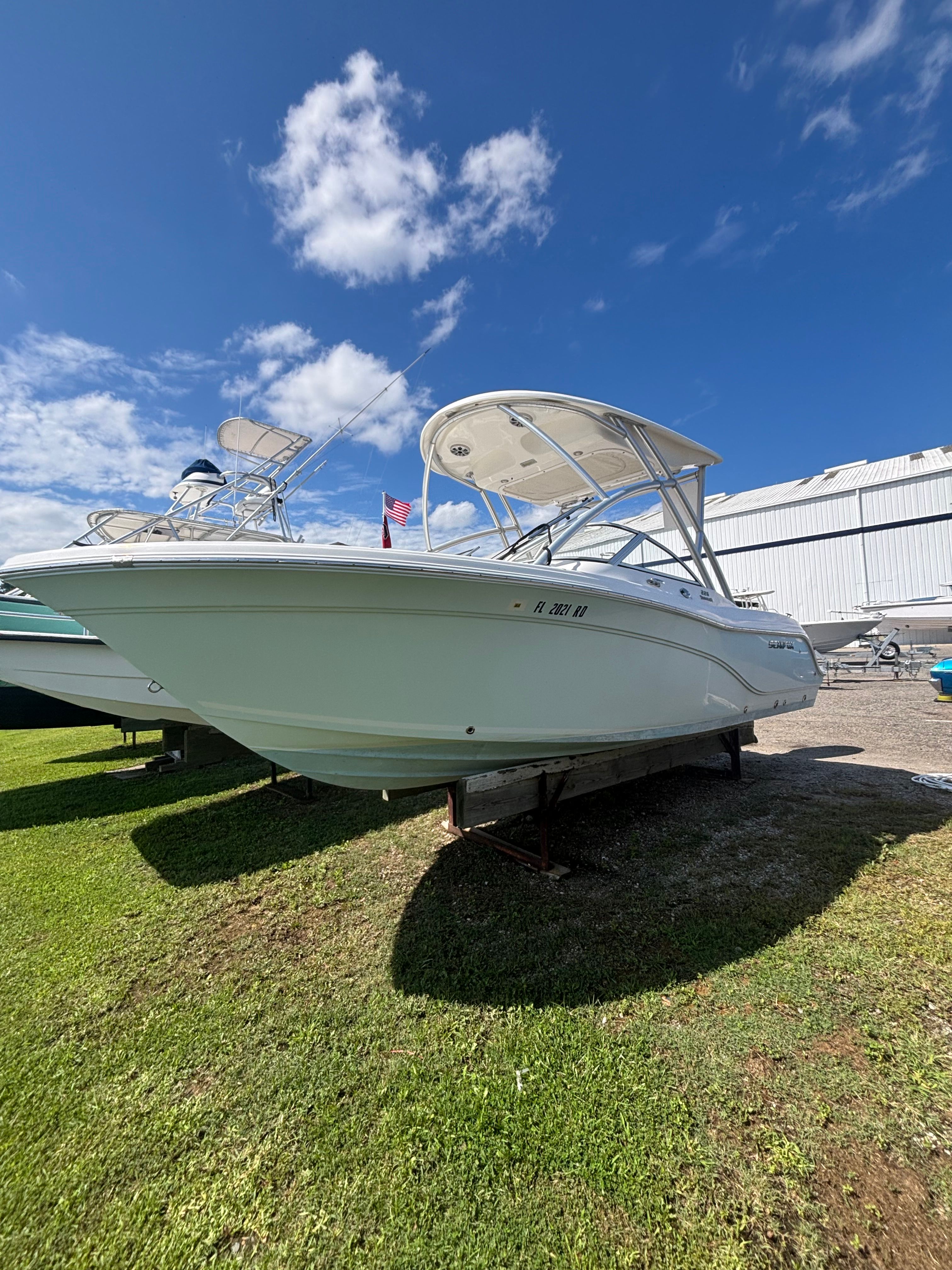 Sea Fox 226 Traveler 2016 Sea Fox 226 Traveler boat on display under a clear blue sky.