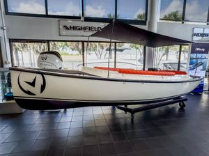 Vision Marine Technologies Fantail 217 2024 Vision Marine Technologies Fantail 217 electric boat displayed indoors.