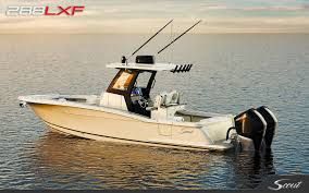 Scout 288 LXF 2026 Scout 288 LXF boat on calm water at sunset.