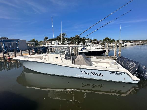 Invincible 42 Center Cabin 2017 Invincible 42 Center Cabin boat docked at marina.