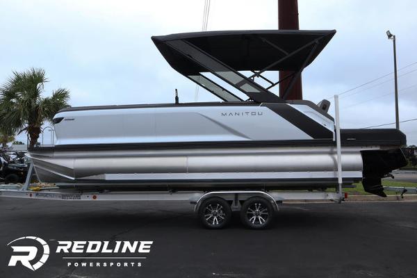 Manitou 22 CUISE BENCH STEALTH 2024 Manitou 22 Cruise Bench Stealth pontoon boat on trailer at Redline Powersports.