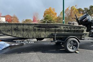 Tracker Grizzly 1650 T Prairie Wings Edition 2026 Tracker Grizzly 1650 T Prairie Wings Edition boat on trailer, outdoors in autumn setting.