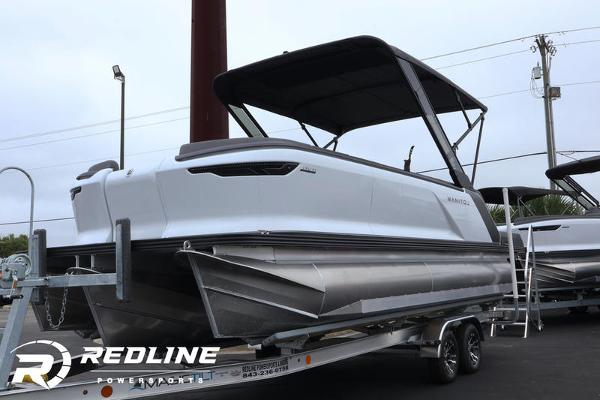 Manitou 22' CRUISE BENCH STEALTH 2024 Manitou 22' Cruise Bench Stealth pontoon boat on trailer at Redline Power Sports.